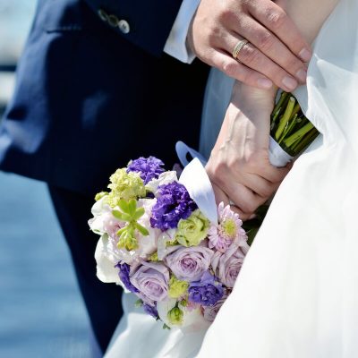 wedding-couple-with-bouquet-PZ4JQMK.jpg